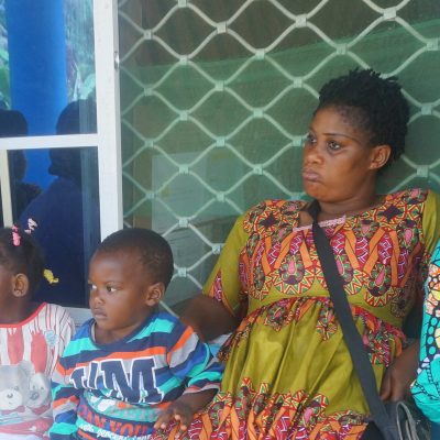 Parents waiting with kids to do the testing